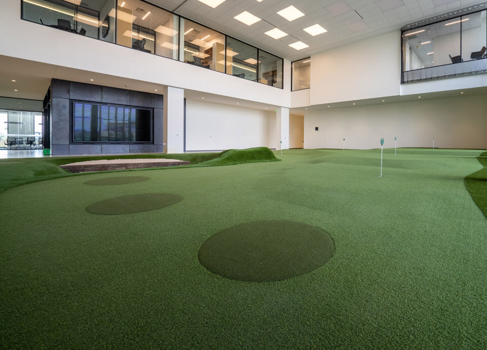 Indoor putting green with chipping matts